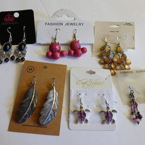 6 pairs of new earrings on cards.